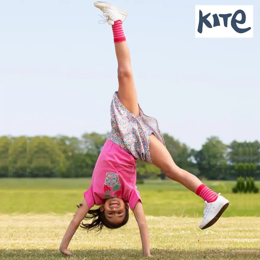 Marcia May Mini - Image of two children in a blanket fort with Liewood Logo