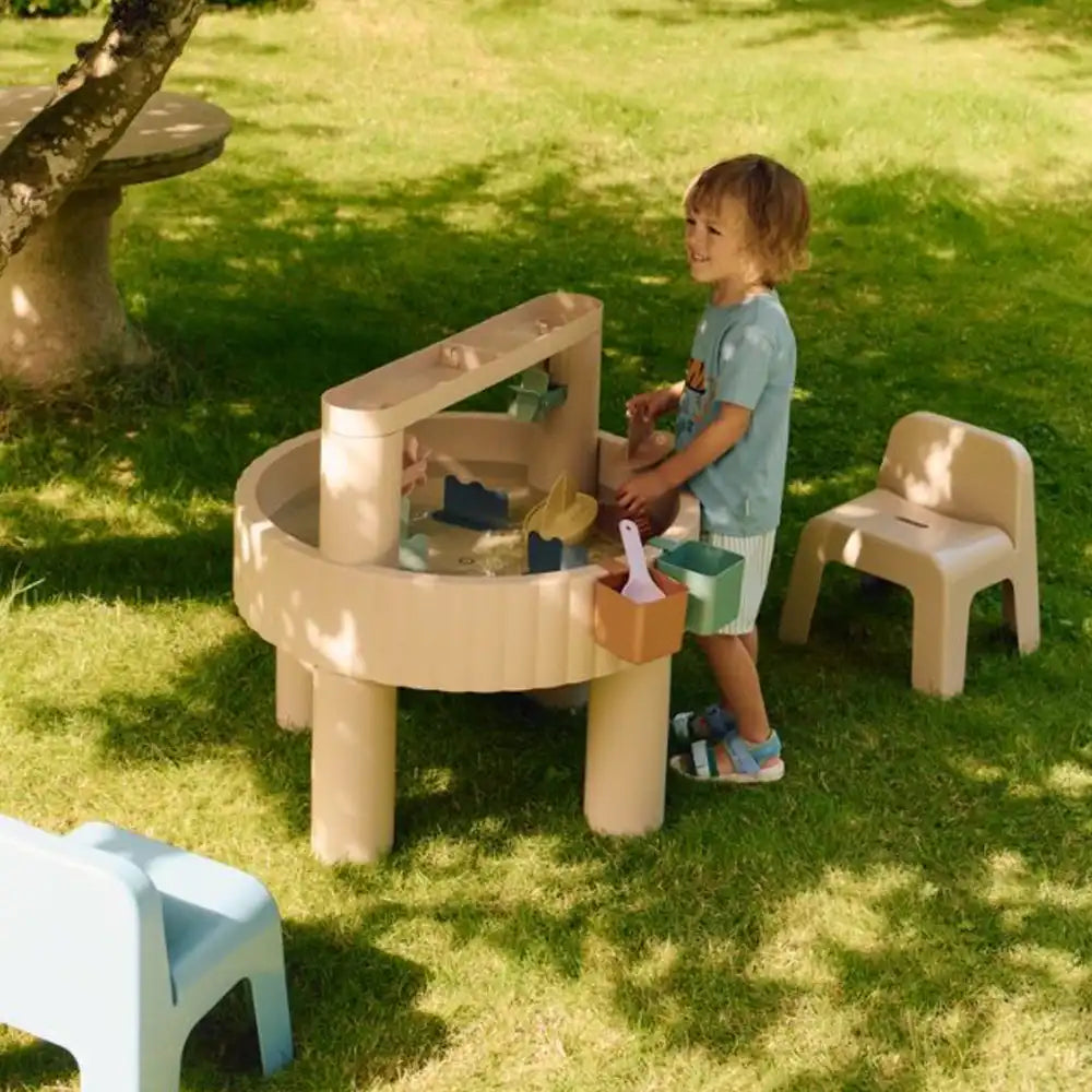 Image of a girl holding a Floss & Rock toy