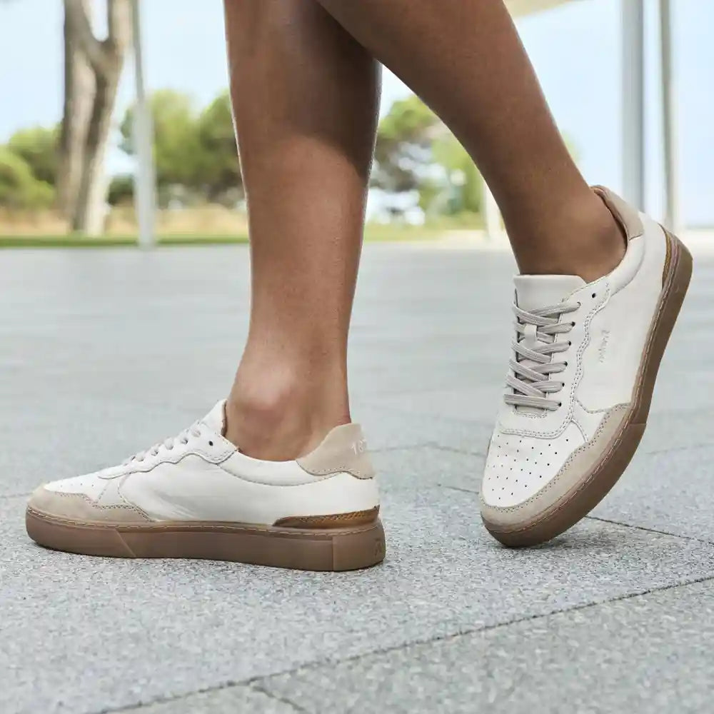 Mens Casual Shoes & Trainers - image of a man's feet wearing casual brown boots