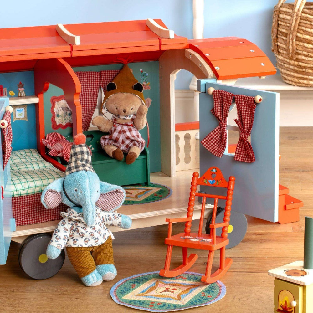small stuffed toys in a playset scene